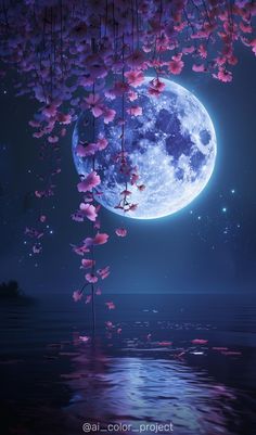 the full moon is shining brightly in the night sky with pink flowers hanging from it's branches