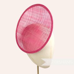 This rounded scoop fascinator hat base is made from a triple layer of fuchsia pink stiffened sinamay millinery fabric and is ideal for making an instant fascinator! The scooped center of the disc allows you to get creative by positioning it at different angles on the head.  Just add elastic, headband or comb for securing to the head (not included but available in our shop!) Measurements: Diameter: 21cm (8.2 inches) Height: 2cm (0.7 inches)  Available in several colours from our millinery supply Vintage Straw Hat, Sinamay Fabric, Red Fascinator, Sinamay Fascinator, Headpiece Diy, Blank Hats, Sinamay Hats, Millinery Supplies, Round Hat