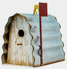 a bird house with a flag sticking out of it