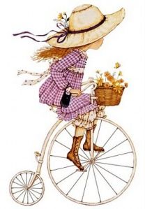 a woman riding on the back of a bike with a basket of flowers in her hand