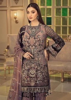 The new festive party wear collection is geared up with chiffon embroidered designer dress for eid. You can buy lavish fancy wear online to adorn your special event look in an elegant manner. Shirt: This lavish attire is highlighting its grace with periwinkle purple color embroidered panels for shirt. Chiffon shirt is embellished with hand embroidered work in beautiful patterns. Chiffon sleeves are also embroidered. Front and front back of shirt are embellished with organza embroidered borders. Chiffon Party Dress, Pakistani Party Wear, Pakistani Designer Suits, Afghan Fashion, Eid Dresses, Chiffon Collection, Embroidered Chiffon, Boutique Dress, Salwar Kameez Designs