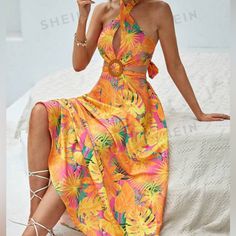 Cut Out Tropical Dress Orange Halter Neck Dress For Beach Party, Yellow Halter Neck Maxi Dress For Party, Bohemian Yellow Maxi Dress For Beach Party, Yellow Fitted Dress For Beach Party, Chic Yellow Dress For Beach Party, Yellow Halter Neck Beach Dress, Yellow Halter Neck Dress For Beach Season, Yellow Maxi Dress For Beach Party, Yellow Sundress For Summer Parties