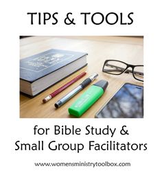 a table with books, pens and other items on it that says tips & tools for bible study & small group facilitators