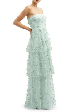 Three-dimensional details combined with tonal embroidery and glimmery sequins bring party-ready energy to this elegant gown with a tiered skirt. 55 1/2" length (size 8) Back zip closure Strapless Lined 100% polyester Hand wash, line dry Imported Strapless Wedding Dress Guest, Floral Spring Bridesmaid Dresses, Green Ankle Length Dress, Pastel Maid Of Honor Dresses, Green Blue Floral Dress, Predebs Dresses, Revolve Bridesmaid Dresses, Bridal Party Dresses Mismatched, Flowy Formal Dress Long