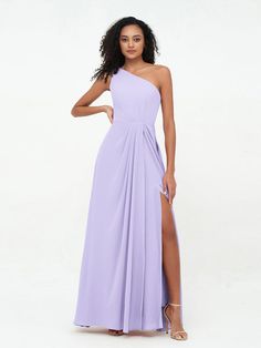 a woman in a long purple dress with one leg slited up and her hand on her hip