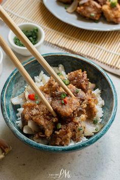 Panko Parmesan Pork Nuggets in a bowl over rice with chopsticks. Pork Nuggets Recipe, Peking Pork Chops Recipe, Crispy Pork Bites, Pork Panko Recipes Keto, Pork Chop Recipes With Panko Crumbs, Pork Nuggets, Recipes Using Pork Chops, Pork Panko, Baked Cauliflower Bites