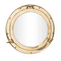 a mirror that is sitting on top of a shelf in the shape of a ship's porthole