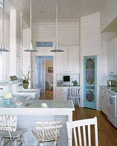 the kitchen is clean and ready to be used as a dining room or living room