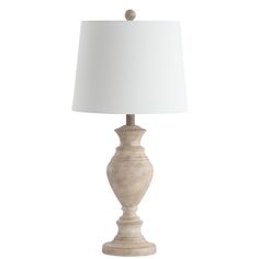 a table lamp with a white shade on it