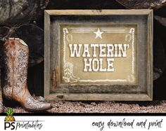 a wooden frame with the words western hole next to some cowboy boots and wood logs