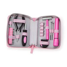 a pink case filled with lots of tools