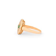 The Story A lovely antique Victorian navette shaped ring featuring old cut stones set in 18 karat rosy-yellow gold ring. A bright emerald is seen at center surrounded by 28 rose cut diamonds ranging in size from 0.75 mm to 2 mm adding a lovely antique sparkle. The elongated center navette is nicely balanced by the slightly graduated ring shank measuring 0.54" tall. Navette rings are a favorite. It looks great on its own or paired with other pieces. The Specs Style Number: R3409 Antique, Victoria Gold Marquise Emerald Ring In 14k Gold, Classic Gold Marquise Emerald Ring, Classic Marquise Emerald Ring In Gold, Heirloom Marquise Emerald Ring In 14k Gold, Gold Emerald Ring With Marquise Diamond, Heirloom Green Marquise Cut Rings, Heirloom Green Marquise Rings, Art Deco Marquise Yellow Gold Rings, Heirloom Gold Marquise Cut Emerald Ring