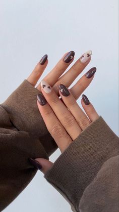 "Looking for a unique and trendy nail design for early fall? Try out these abstract nail art ideas that are sure to make a statement. 💅✨ #AbstractNails #NailArt #TrendyNails #NailGoals #FallFashion #NailInspo #NailDesigns #NailObsessed #FallNails" Homecoming Nails 2023, Dark Brown Gel Nails Short, Simple Nail Art Fall, Cute Brown Nail Ideas, Brown Nails Natural, Acrylic Nail Designs Autumn, Nails Braun, Brown Nails Inspiration, Trendy Nails Classy