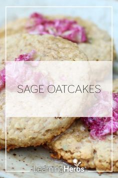 three oatmeal cookies with red cabbage on top and the words sage oatcakes above them