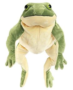 a stuffed frog sitting on its hind legs