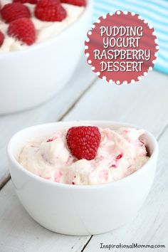 two bowls filled with raspberry dessert on top of a white table