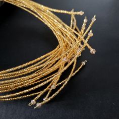 Party Jewelry In Gold-tone With Gold Beads, Trendy Gold Jewelry For Festivals, Elegant Gold Choker For Festive Occasion, Beaded Gold Metal Jewelry, Elegant Party Gold Beaded Necklaces, Elegant Gold Beaded Necklaces For Parties, Elegant Party Beaded Necklaces With Gold Beads, Party Gold-tone Necklace With Gold Beads, Elegant Adjustable Pendant Beaded Necklace