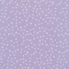 a purple background with small white flowers on it