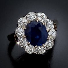 an antique sapphire and diamond cluster ring