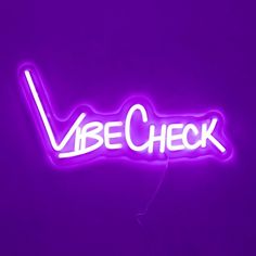 a purple neon sign that says vibe check