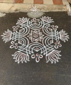 a white and red design on the ground