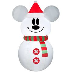 an inflatable snowman with a santa hat and scarf