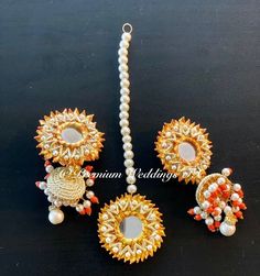 This is a Maang Tikka & Gotta Jhumki set that is handcrafted with high quality material. A must-have for any Indian/Pakistani bride, these unique handmade Gotta Ghungroo Jhumki set is made with fresh water pearls (Tikka) and jingle bells. One size fits all. It comes in a pouch to keep it protected and a perfect gift to give out to your bridesmaids or guests at your wedding. These come in various colors, in separate listings. NO RETURN - NO EXCHANGES - CANCEL ORDERS WITHIN 12 HOURS * Set Includes Maang Tikka Set, Bridesmaid Favors, Maang Tikka, Fresh Water Pearls, Water Pearls, Wedding Jewelry Sets, Jingle Bells, Earrings Handmade, Fresh Water