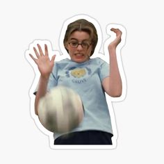 a woman with glasses holding a white ball in her right hand and making a face