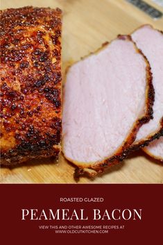 sliced ham on a wooden cutting board with the words roasted glazed peameal bacon