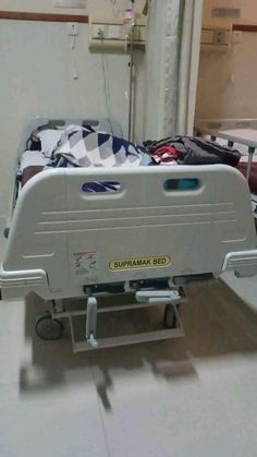 a hospital bed sitting in the middle of a room