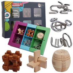 the wooden puzzle is next to several pieces of wood and some metal hooks, including one piece