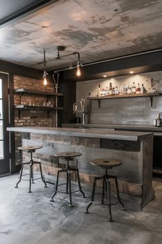 a bar with three stools in front of it