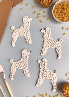 the cookies are made to look like poodles and macaroni salad noodles