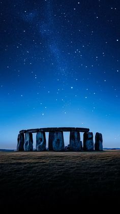 the night sky over stonehenge in england