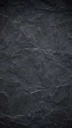 black marble textured background with dark edges