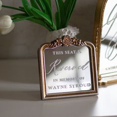 there is a plaque that says this seat is reserved in memory of wayne stroud