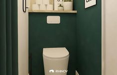 a bathroom with green walls and a white toilet in the corner next to a window