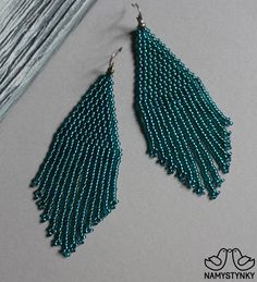 These emerald beaded earrings are made of high-quality Czech beads and strong synthetic thread. They are elegant, fashionable, and highly versatile, suitable for everyday wear. Features: Sterling silver components Color: green. This item is currently in stock. You must be completely satisfied. If you find merchandise unsatisfactory for any reason, return it within 10 days and your money will be refunded without questions. These earrings in gold color https://www.etsy.com/listing/660046267/gold-b Evening Earrings, Earrings Luxury, Earrings Chandelier, Luxury Earrings, Earrings Green, Seed Bead Earrings, Czech Beads, Bead Earrings, Chandelier Earrings