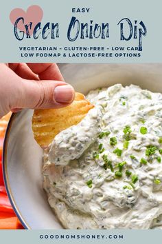 a hand dipping a cracker into a bowl of green onion dip with text overlay