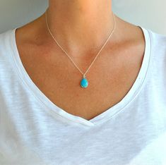 Inspired by the beauty and simplicity of the sky and the colors of the sea. A small turquoise drop hanging from a delicate high quality sterling silver chain. Wear it with your dress or with your jeans! Turquoise matches with every colour and will add class to every outfit! The perfect gift! ▶ Get the matching earrings: https://etsy.me/3haGUDo ▶ The turquoise pendant measures approximately 17mm / 0.67 " (small). ▶ You can choose your necklace's length when placing your order. The length of the n Pendant For Women, Nature Inspired Jewelry, Jade Jewelry, Genuine Turquoise, Emerald Jewelry, Turquoise Pendant, Necklace Sterling Silver, Drop Pendant, Birthstone Necklace