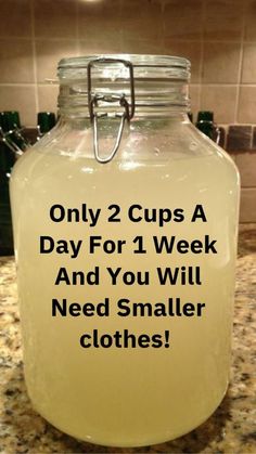 a mason jar with the words only 2 cups a day for 1 week and you will need smaller clothes