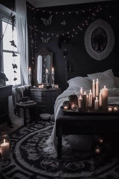 a bedroom with candles lit on the bed