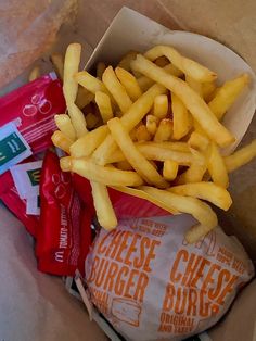 french fries and chips in a paper bag