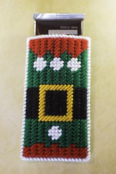 a cell phone case made to look like a christmas sweater