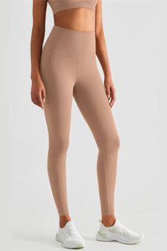 Yes, these Lexi Cacao High-Rise Tight Leggings are everything we love so far. Made of stretchy Lycra fabric, the high-waisted design highlights your figure. Pair these leggings with a crop top and sneakers for the ensemble we've always dreamed of.  Full Length: Approx 73cm Materials: 81% Nylon, 19% Lycra® elastane Stretch Type: Very Stretchy Gentle Dry Clean Only  Model is 5 ft 7 and wears size 6  Colour may vary due to lighting on images. The product images (without model) are closest to th High Rise Tight Elastane Leggings, Beige Fitted Leggings For Yoga, Compressive Full-length Leggings, Fitted Beige Leggings For Yoga, Fitted Beige Yoga Leggings, High Stretch Workout Legwear, High Stretch Legwear For Workout, Tight Beige Yoga Leggings, Solid Tight Mid-rise Leggings