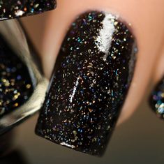 Silhouette is a stunningly rich black based holographic nail polish with a twist! Carefully formulated with the perfect blend of gold micro-flakes ranging in size and holographic micro-flakes, Silhouette builds an incredibly elegant finish with every succeeding layer! Max. Coverage in 2 to 3 coats! Pet Poems, Metallic Nails Design, Black Nails With Glitter, Dog Poems, Black Holographic, Nail Shimmer, Holographic Nail Polish, Chic Holiday, Nails Winter