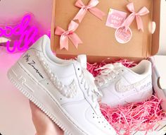 Make your day extra special with these beautiful and unique custom bridal sneakers! * Brand New 100% Authentic sneakers! * FREE SHIPPING within the US territory!  * Rhinestones/pearls Swoosh Bridal Custom made-to-order sneaker. * Hand-painted lettering on the outer sides of each shoe. Get them Personalized! - Size Guide- C (Child) Y (Youth) W (Women) M (Men.) - Acrylic Waterproof paint - ALWAYS Hand-Pianted, we never use stickers to make sure the shoes last a long time! - Available in Low, Mid, and High styles. - 100 % Authentic products purchased from the original retailer - The sizes are unisex so please don't panic if, for example, you order a 6.5 M and receive an 8 W, THEY ARE EXACTLY THE SAME SHOES and will fit the same. Please refer to the Size Guide. - NO RETURNS. Custom shoes are m Customizable Lace-up Sneakers For Gift, White Low-top Sneakers As Gift, White Round Toe Sneakers For Gift, Customizable Lace-up Sneakers For Gifts, Custom White Sneakers For Gift, Customizable Low-top Sneakers As A Gift, Customizable White Sneakers For Gift, Customizable Low-top Sneakers For Gift, Customizable Low-top Sneakers As Gift