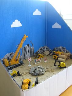 there is a construction scene made out of sand