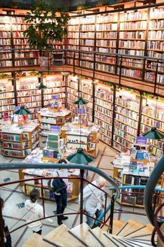 the inside of a library filled with lots of books