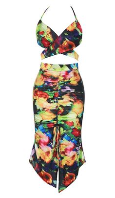 a women's two piece top and skirt set in multicolored floral print